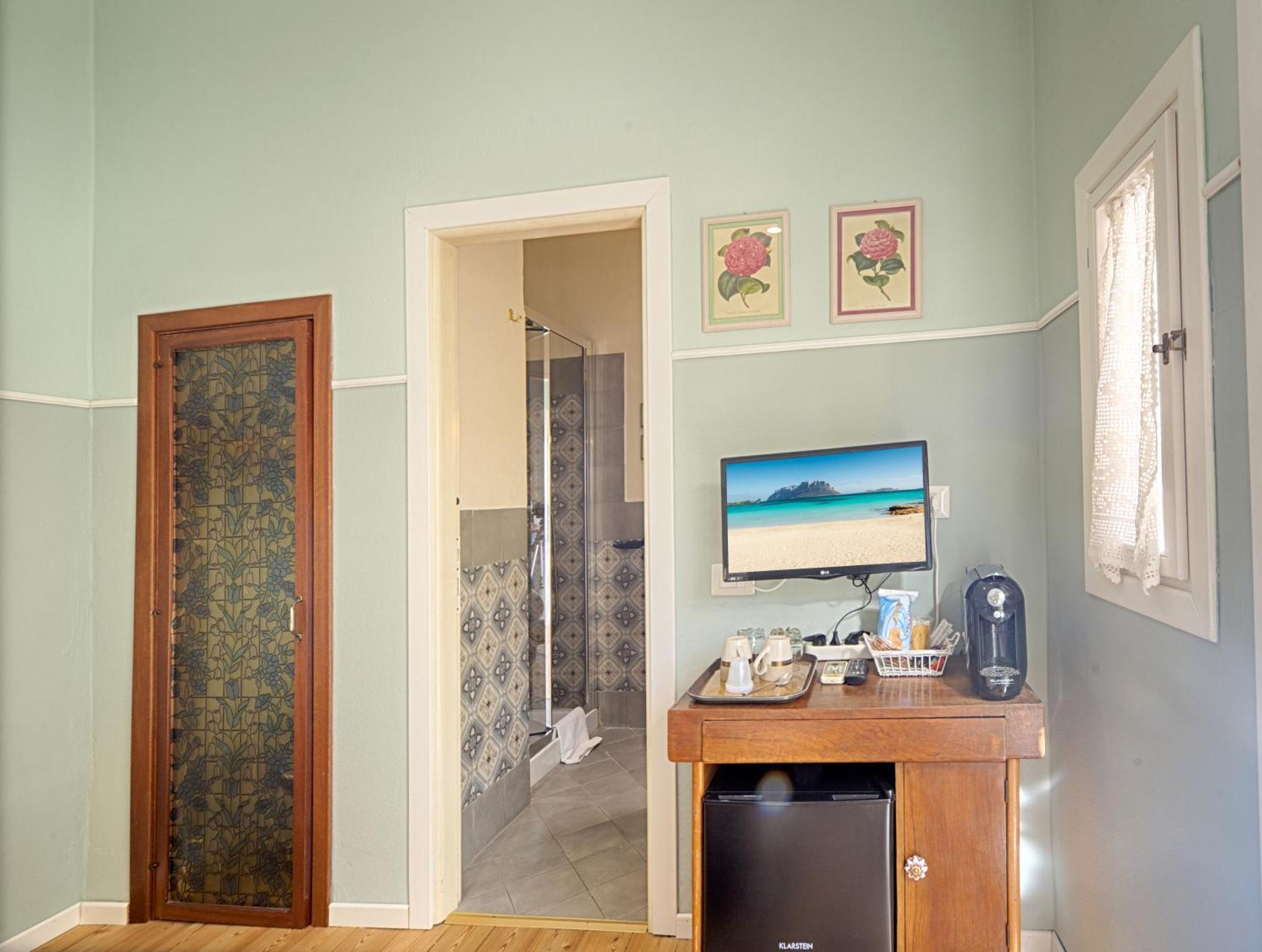Casa Satta 1925 Hotel Olbia Phòng bức ảnh